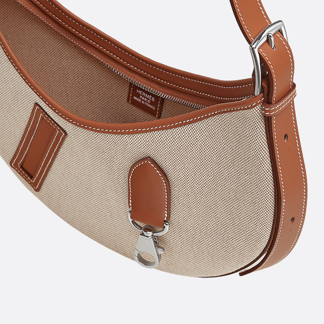 P’TIT ARÇON BAG IN CANVAS & LEATHER HERMÈS