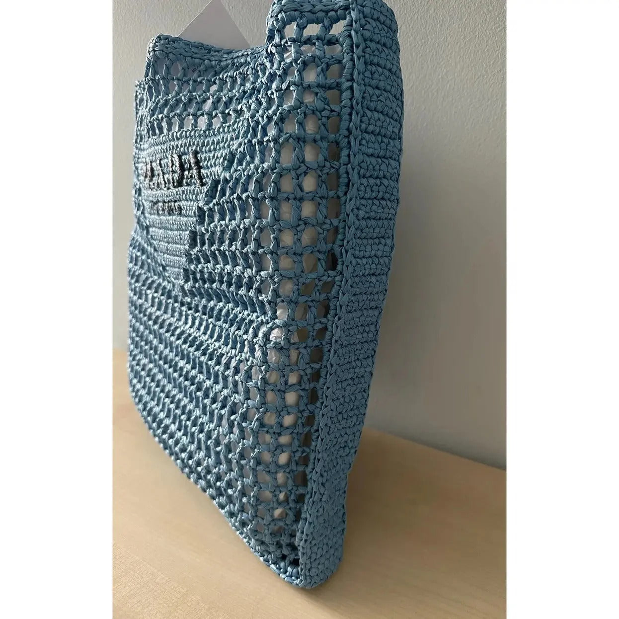 PRADA SHOPPER BAG IN RAFFIA WITH WOVEN LOGO – BLUE