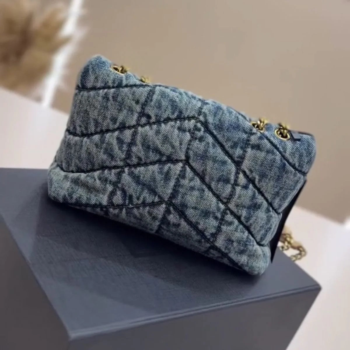 LOULOU PUFFER BAG IN QUILTED VINTAGE DENIM